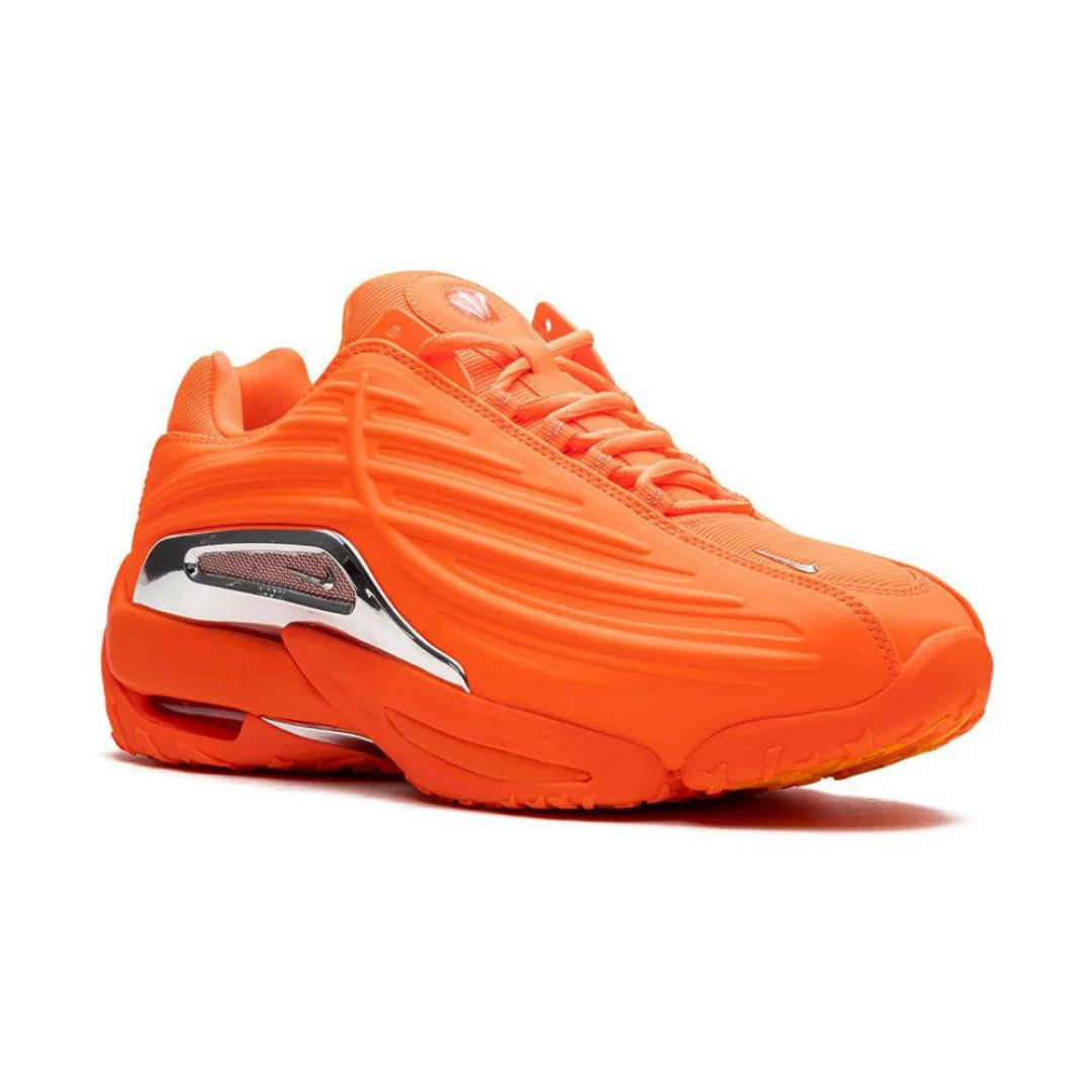 Nocta Metallic Orange · Nike · Nova Neta