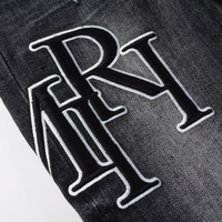 Amr Staggered Black Jeans