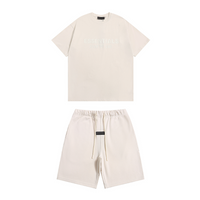 Essentials Short Set Crema Logo