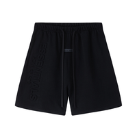 Essentials Shorts Negro Monograma Blanco