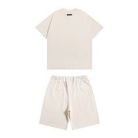 Essentials Short Set Crema Logo