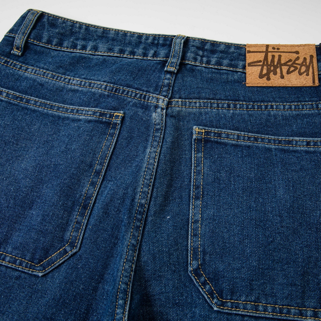 Stussy Jeans Azul Logo Blanco