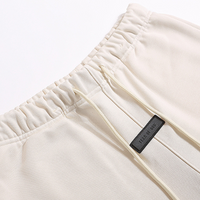 Essentials Short Set Crema Logo