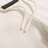 Essentials Short Set Crema Logo