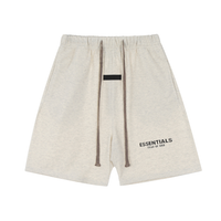 Essentials Shorts Liso Gris Logo Negro