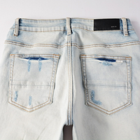 Amr Red Patch Distressed Jeans