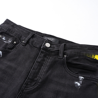 Amr Staggered Logo Jeans