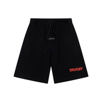 Essentials Shorts Corto Negro Logo Rojo
