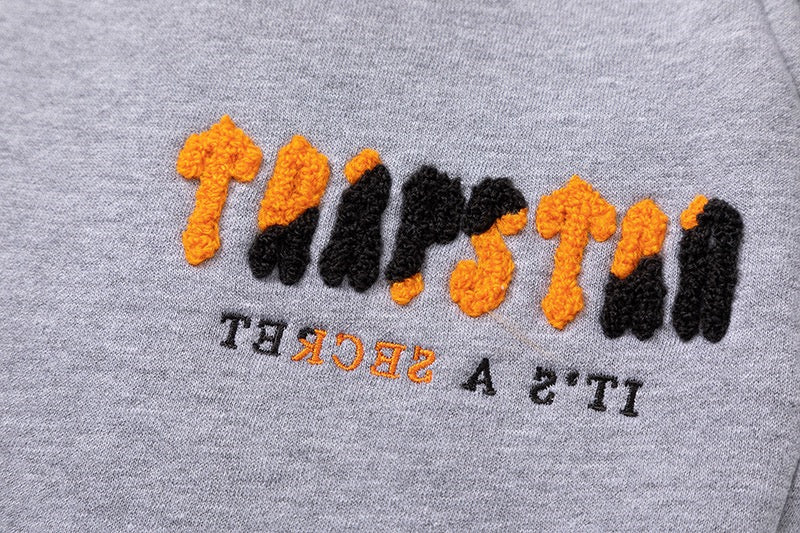 Decoded Grey Orange Tracksuit · Trapstar · Nova Neta