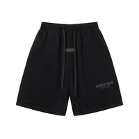 Essentials Shorts Liso Negro Logo Blanco